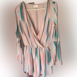 Pastel multicolor romper with bell sleeves. Size small. Great condition!
